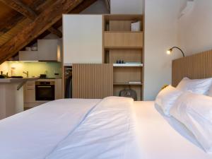 Postel nebo postele na pokoji v ubytování Apartment Twin Deluxe Studio by Interhome