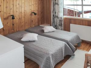 Кровать или кровати в номере Holiday Home Rukan rauha by Interhome