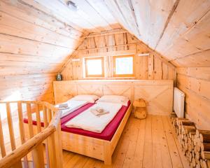 Postel nebo postele na pokoji v ubytování Vila Triglav on Pokljuka