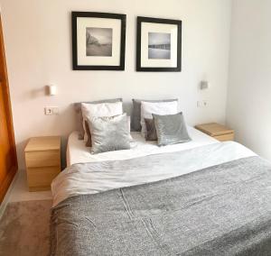 Postel nebo postele na pokoji v ubytování Apartamento playa 2 Fassers piscina Port Pollensa