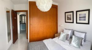 Postel nebo postele na pokoji v ubytování Apartamento playa 2 Fassers piscina Port Pollensa
