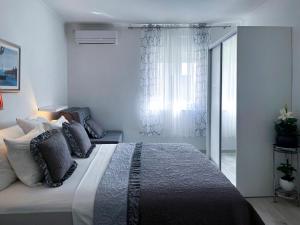 Postel nebo postele na pokoji v ubytování Apartment Vitturina