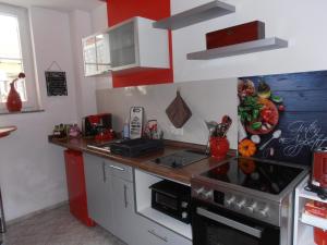 Kuchyň nebo kuchyňský kout v ubytování Schöne Moderne Wohnung + 11 fotografií