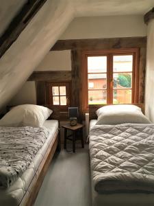 Postel nebo postele na pokoji v ubytování Fischerhus Lütt Hauke 69 qm Traudel