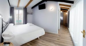 Posteľ alebo postele v izbe v ubytovaní Casa do cabo