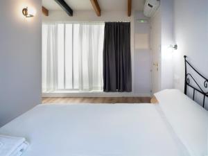 Posteľ alebo postele v izbe v ubytovaní Casa do cabo