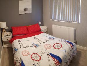 Giường trong phòng chung tại luxury 2-Bed modern chalet in Bridlington +10 ảnh