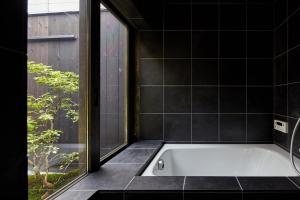 Koupelna v ubytování YADORU KYOTO HANARE Washi No Yado + 3 fotografie