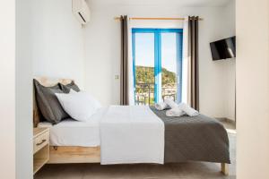 Postel nebo postele na pokoji v ubytování Blue Horizon