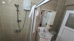Koupelna v ubytování sea view , 2 person jacuzzi,sea 50 meters