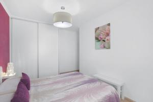 Postel nebo postele na pokoji v ubytování Apartamento Porís