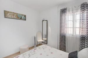Postel nebo postele na pokoji v ubytování Apartamento Porís