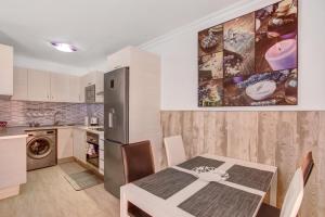 Kuchyň nebo kuchyňský kout v ubytování Apartamento Porís