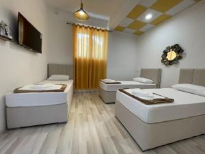 Postelja oz. postelje v sobi nastanitve Hostel Izvor
