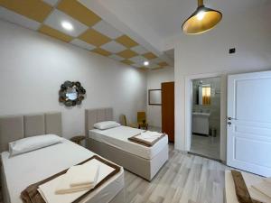 Кровать или кровати в номере Hostel Izvor