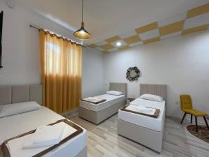 Postelja oz. postelje v sobi nastanitve Hostel Izvor