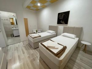Postelja oz. postelje v sobi nastanitve Hostel Izvor
