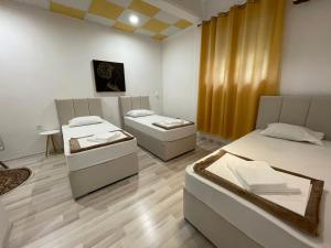 Postelja oz. postelje v sobi nastanitve Hostel Izvor