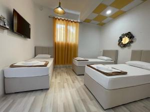 Postelja oz. postelje v sobi nastanitve Hostel Izvor