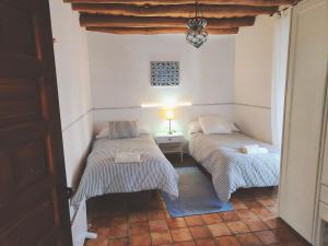 Posteľ alebo postele v izbe v ubytovaní La Era de San Blas Jacuzzi exterior