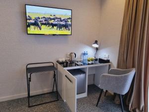 TV o dispositivi per l'intrattenimento presso Hotel Autograph