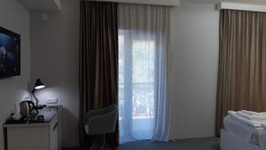 Letto o letti in una camera di Hotel Autograph