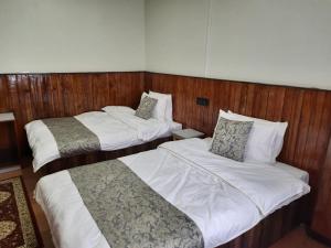 Postel nebo postele na pokoji v ubytování Kanari B&B