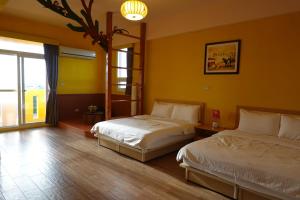 Postel nebo postele na pokoji v ubytování Provence Homestay