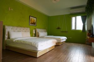 Postel nebo postele na pokoji v ubytování Provence Homestay