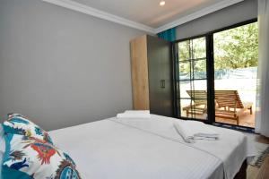 Kép Riva - Kayaköy de 2+1 Tatil Villası szállásáról Fethiyében a galériában