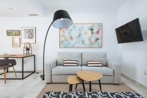 Televízia a/alebo spoločenská miestnosť v ubytovaní Redes Suite Apartment with Terrace