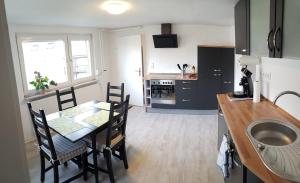 Kuchyň nebo kuchyňský kout v ubytování Ferienwohnung an der Schelde + 10 fotografií