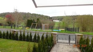 a view of a park with a playground at FeWo Eberau in Ebrach