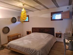 Krevet ili kreveti u jedinici u okviru objekta Gîte La Grange