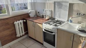 Kuchnia lub aneks kuchenny w obiekcie Apartament M-3 CENTRUM