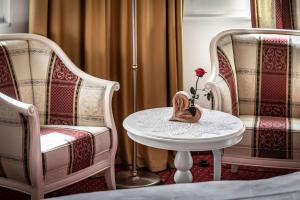 Posezení v ubytování Hotel Weisse Lilie - B&B