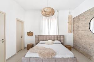 מיטה או מיטות בחדר ב-Perfect Villa