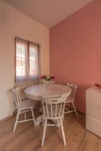 a dining room with a table and chairs and a window at La Casa di Cheyenne - SEA VIEW 011019-LT-0221 in Monterosso al Mare