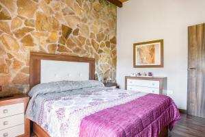 Postel nebo postele na pokoji v ubytování Casa Juan Alba