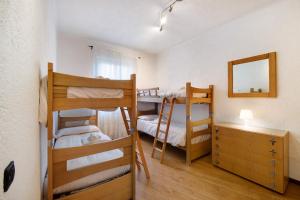 Una cama o camas en una habitación de Topazio 28 fotos más