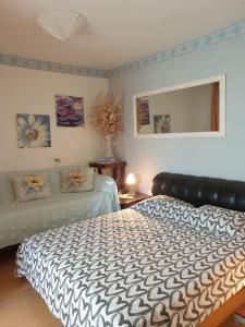 Ένα ή περισσότερα κρεβάτια σε δωμάτιο στο Apartments Eva