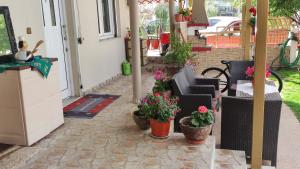 A patio or other outdoor area at Alexandros Guesthouse