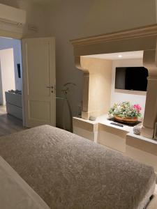 Llit o llits en una habitació de Suite della Scala