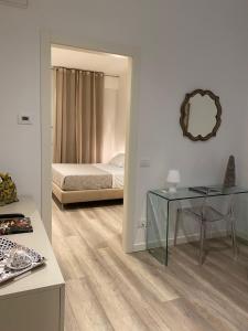 Llit o llits en una habitació de Suite della Scala