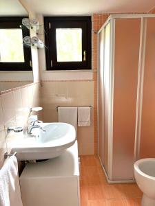 a bathroom with a sink and a shower at Ai house boutique in Castel di Sangro +16 photos