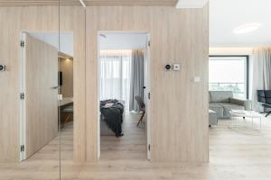 Posedenie v ubytovaní Apartament MORSKIE WIDOKI Natural Baltic Darłówko