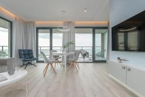 Posedenie v ubytovaní Apartament MORSKIE WIDOKI Natural Baltic Darłówko