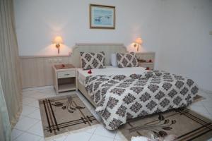 Postel nebo postele na pokoji v ubytování Hotel Royal Jinene Sousse