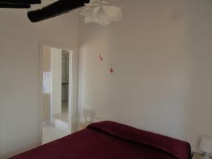 Posteľ alebo postele v izbe v ubytovaní alcastello - Casamatta via Dante Alighieri,36
