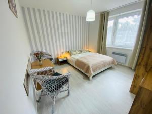 Postel nebo postele na pokoji v ubytování Villa Horyzont
